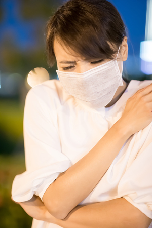 woman get sick and feel pain at nightの写真素材