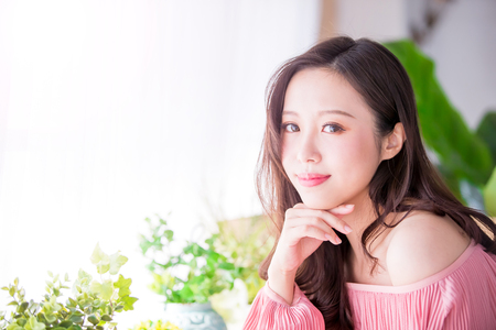 Beauty woman smile to you at homeの写真素材