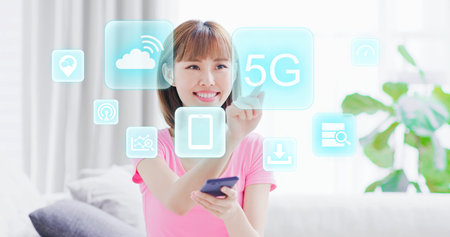 Young woman hold smart phone and touch 5G technology icon with virtual screen interface