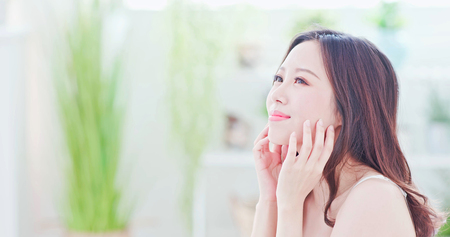 Beauty Asian Skin care woman smile to you at homeの写真素材