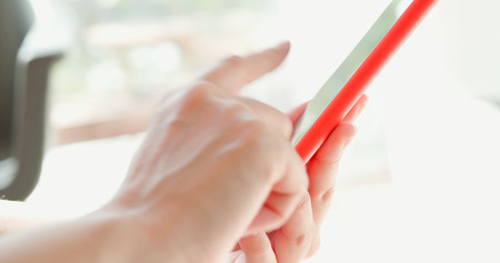 closeup of people touch screen on the smart phoneの写真素材
