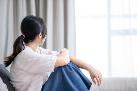 The depression woman think something at homeの写真素材