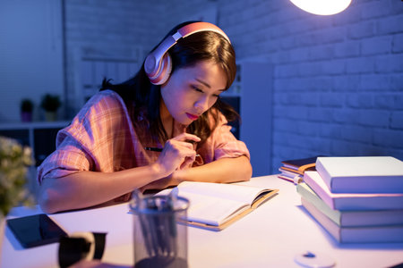 asian student study hard in the evening