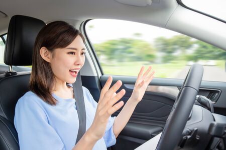 relaxed woman experience to riding an autonomous self driving carの写真素材
