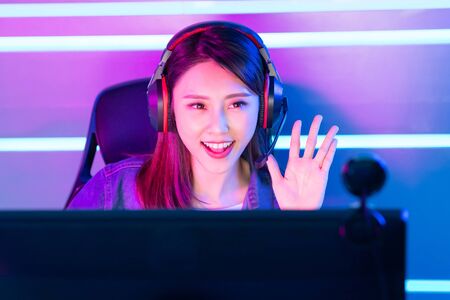 Young Asian Pretty Pro Gamer have live stream and say hello to fans happilyの写真素材