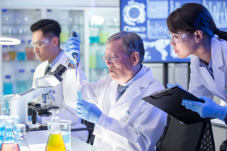 asian quality control expert is looking specimen on microscope and meeting