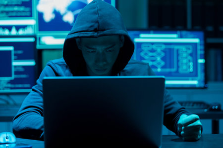 Asian male hacker look at you weirdly