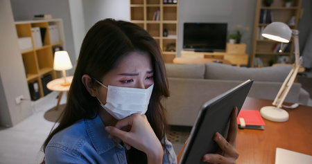 Asian business woman use laptop and work at home in the evening
