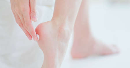 Telemedicine concept-asian female doctor listening to patient talking symptom on the internet and she show ok gestureの写真素材