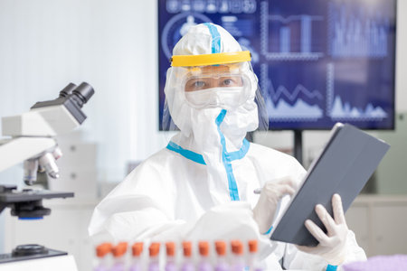 asian customer service representative working in the officeの写真素材