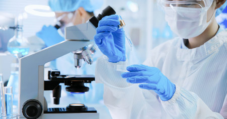 asian scientist team about skin care and cosmetic product working in science laboratory