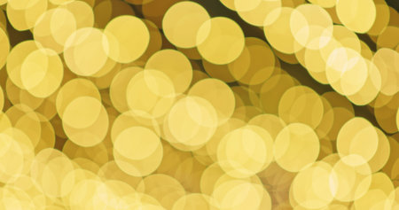 blur abstract background of golden holiday lights