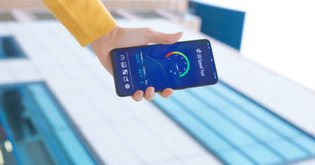 5G smart phone user check the internet speedの写真素材