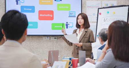 corporate teamwork-young asian busineswoman lead group of business startup team in strategic meeting...