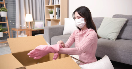 Women stay home shopping online receive a container