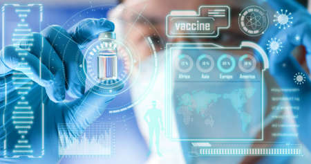 covid19 vaccine bottle in asian doctor hand he wearing rubber glove and face mask with Graphical User Interfaceの写真素材