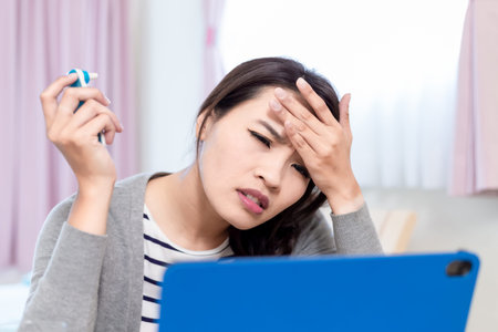 Telemedicine concept-asian female patient consult her health condition to doctor in front of tablet...