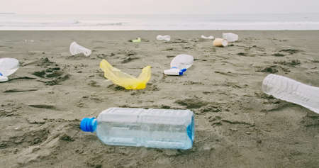 Environmental pollution and trash or garbage on the beachの写真素材