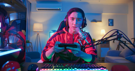 Young Asian Pro Gamer have live stream at home