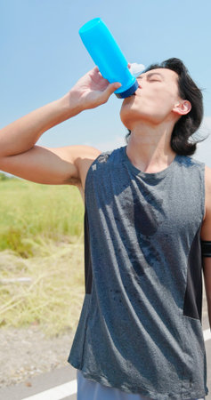 close up of asian man ride a bicycle on countryside happilyの写真素材
