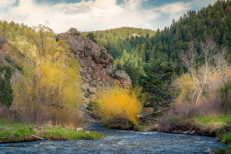 Landscape of river flowing into mountains.の写真素材