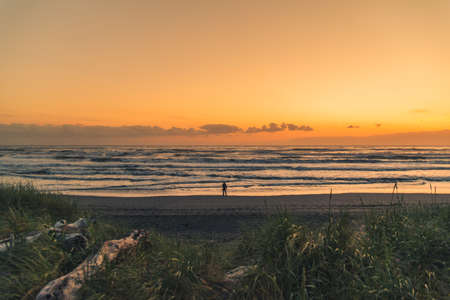 Looking into the horizon at sunset.の写真素材