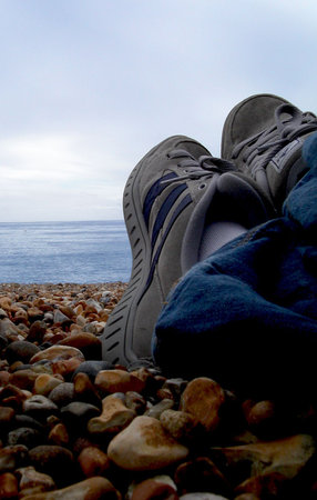 relaxing on beach in brightonの写真素材