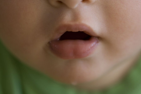 close up of a babies mouthの写真素材