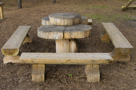 Wooden picnic table in the resort area