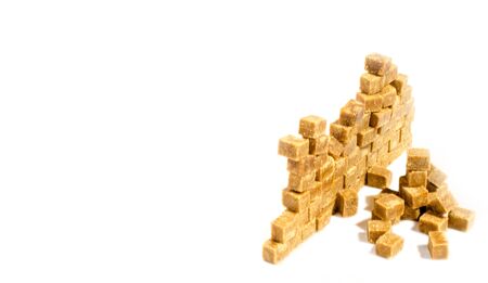 Cubes of cane sugar isolated on white backgroundの写真素材