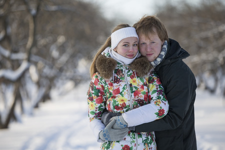 Young couple having fun on the snowの写真素材