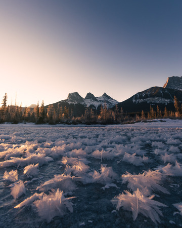 The Three Sisters are a trio of peaks near Canmore, Alberta, Canada. They are known individually as Big Sister Faith, Middle Sister Charity and Little Sister Hopeの写真素材