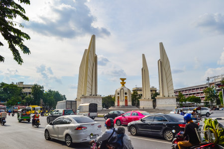 BANGKOK, THAILAND, Street View Of Democracy Monument With Sky At Ratchadamnoen Historic Road, The Democracy Monument is a Public Monument in The Centre of Bangkok.のeditorial素材