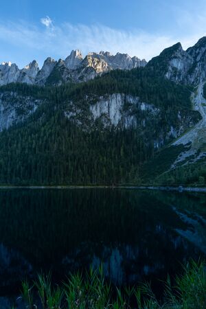 Lake Gosausee is one of the most beautiful places in Austrian Alps, The scenery around is just breathtaking, you can see beautiful mountains around and also the Dachstein glacier. Tourism in Austria.の写真素材