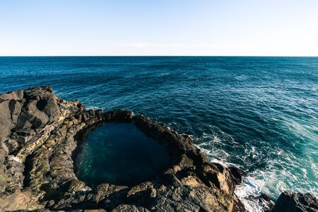 Lava rock pool called Brimketill is very interesting spot in Reykjanes peninsula in Iceland. Tourism in Icelandの写真素材