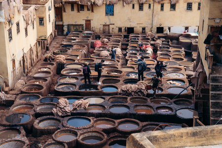 15.5.2023 Fes, Morocco: A famous Chouara tannery in Fes, Morocco, showcasing the ancient art of leather dyeing using natural techniques and vibrant colors. High quality photoのeditorial素材