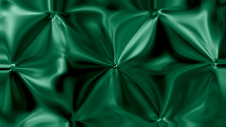 Luxurious emerald green glossy satin look with centered tufted points soft highlights and deep folds creating a quilted fabric style abstract background.の写真素材
