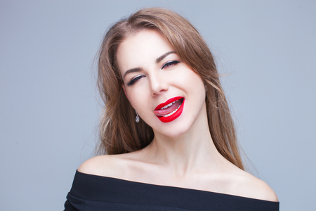 Beauty Model Girl Portrait. Beautiful Woman Face. Looking at Camera. Isolated on White Background. Pretty Girl. Red lipstick. natural blondeの写真素材