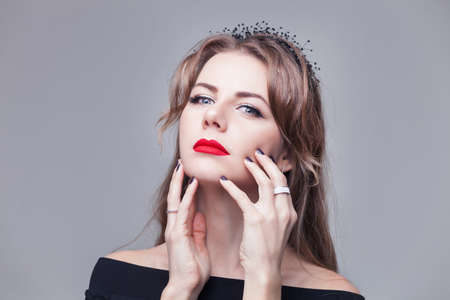 Beauty Model Girl Portrait. Beautiful Woman Face. Looking at Camera. Isolated on White Background. Pretty Girl. Red lipstick. natural blondeの写真素材