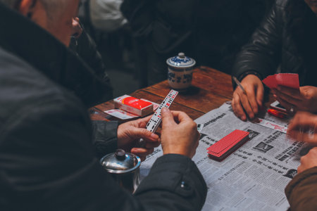 Customers playing cards game at tea house in Chongqing, Chinaのeditorial素材