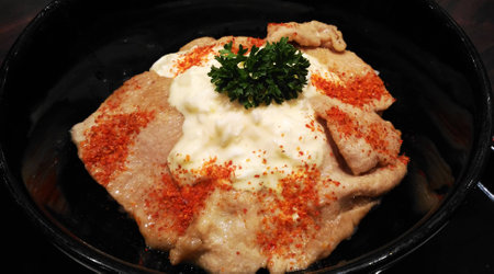 Japanese food style, rice with fried pork topping Cayenne pepperの写真素材