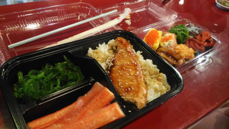 japanese rice with salmon and shrimp bentoの写真素材