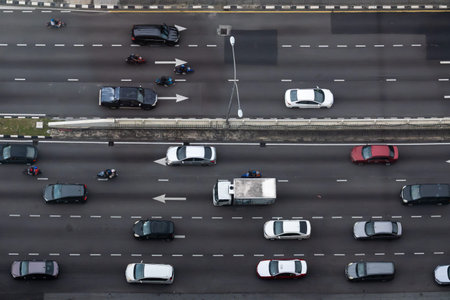 Aerial view of traffic jam with cars on the road in the city