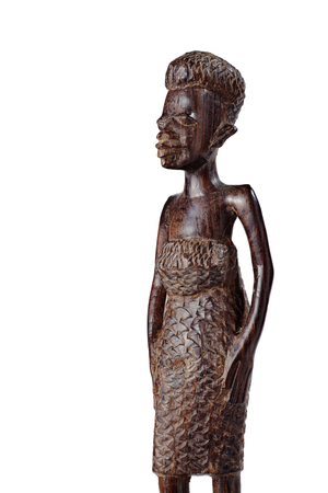 African Statue of a Girl in a Dress Made ââof Mahogany Over White Knee Lengthの写真素材