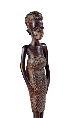 African Statue of a Girl in a Dress Made ââof Mahogany Over White Knee Lengthの写真素材