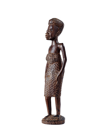 African Statue of a Girl in a Dress Made ââof Mahogany Over White at Three-Quarter Viewの写真素材