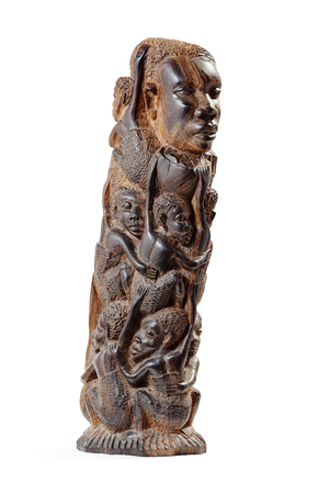 African Wooden Figurine at Three-Quarter Over Whiteの写真素材