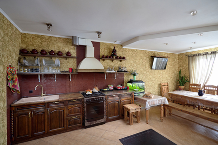 Living room and Kitchen in Village Style in Brown Tonesの写真素材