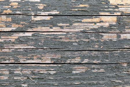 Vintage wood horizontal cracks background with blue grunged peeling paint and copy spaceの写真素材
