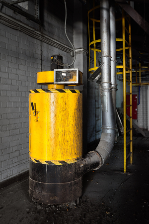 Separator dust collector in modern production. Dust collector cleans air from dry dust in shops of enterprises of various industries, mechanical workshops. The concept of labor protection.の写真素材
